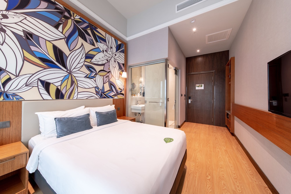 Habitación Deluxe, 1 cama de matrimonio del hotel Bencoolen@hong Kong Street. Foto 1