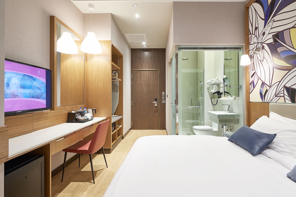 Habitación ejecutiva, 1 cama de matrimonio grande del hotel Bencoolen@hong Kong Street. Foto 1
