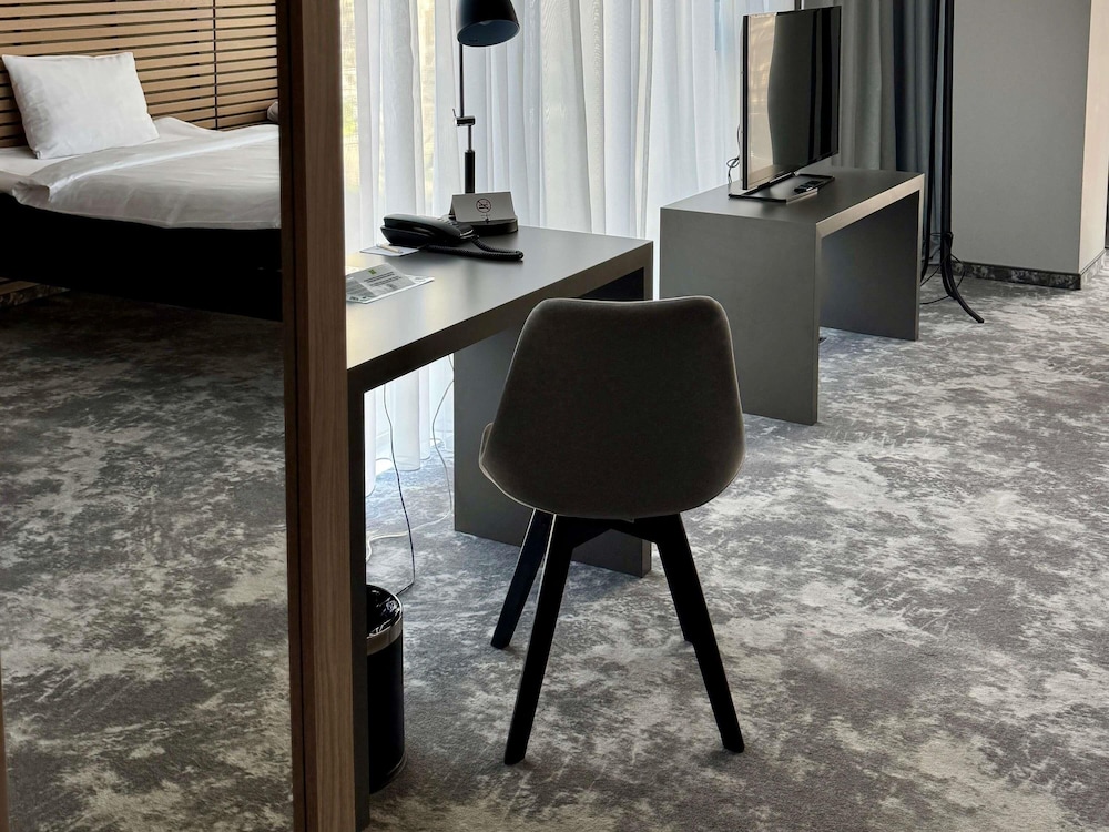 Habitación estándar con dos camas individuales del hotel Ibis Styles Warszawa City. Foto 5