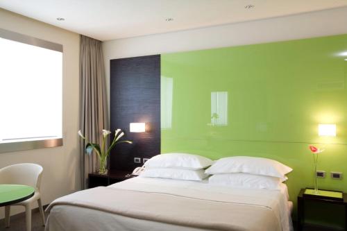 Habitación Doble Deluxe del hotel Unahotels T Cagliari