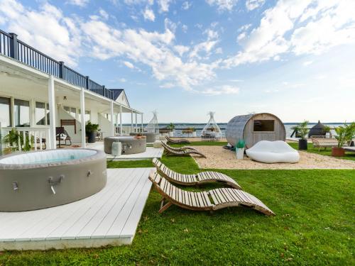 Habitación Deluxe - 1 cama extragrande del hotel Aqua by American Beech. Foto 31