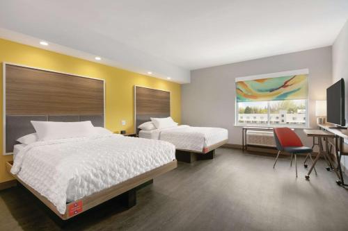 Habitación con 2 camas grandes y acceso para personas de movilidad reducida del hotel Tru By Hilton Williamsville Buffalo Airport