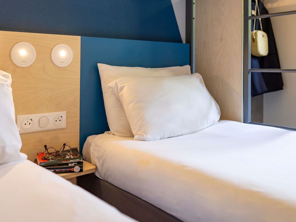 Habitación doble Cama Litera 2 Camas individuales del hotel Ibis budget Bourg en Bresse