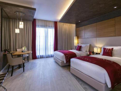 Habitación Deluxe con vistas al lago - 2 camas individuales del hotel Mövenpick Du Lac Tunis
