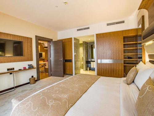 Suite de 1 dormitorio del hotel Mövenpick Du Lac Tunis. Foto 3
