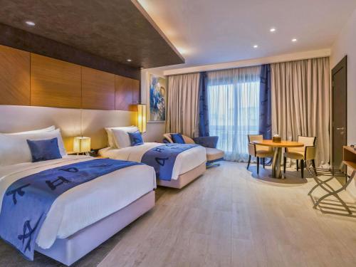 Habitación Doble Superior - 2 camas del hotel Mövenpick Du Lac Tunis. Foto 2