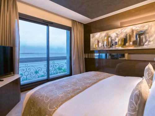 Suite Presidencial con vistas al lago del hotel Mövenpick Du Lac Tunis. Foto 7