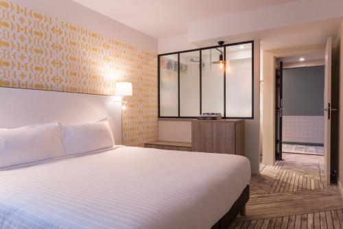 Suite Junior del hotel The Originals Boutique, Maison Montmartre, Paris Les Puces. Foto 3