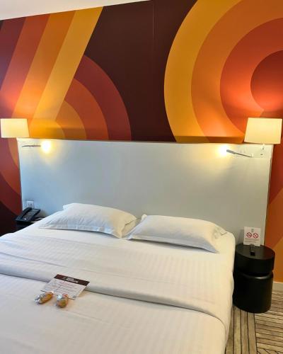 Suite Junior del hotel The Originals Boutique, Maison Montmartre, Paris Les Puces. Foto 11