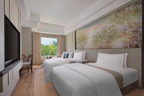 Premium Double Room with Free Daily Resort Activities and Kids Amenities del hotel The Westin Resort Nusa Dua, Bali. Foto 1
