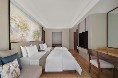 Premium Double Room with Free Daily Resort Activities and Kids Amenities del hotel The Westin Resort Nusa Dua, Bali. Foto 2