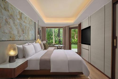 Deluxe King Garden Terrace with Free Daily Resort Activities and Kids Amenities del hotel The Westin Resort Nusa Dua, Bali. Foto 2