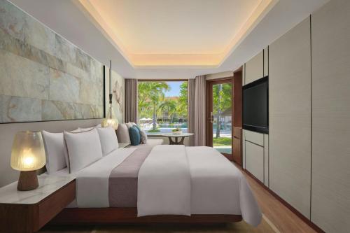 Deluxe King Terrace Pool access with Free Daily Resort Activities and Kids Amenities del hotel The Westin Resort Nusa Dua, Bali. Foto 3