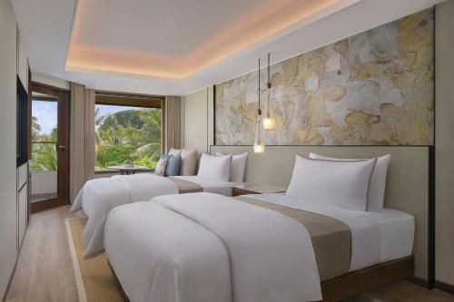 Deluxe Double Terrace Pool Access with Free Daily Resort Activities and Kids Amenities del hotel The Westin Resort Nusa Dua, Bali. Foto 1