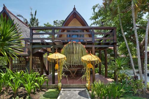 Habitación Doble Lumbung Hut del hotel Vila Ombak. Foto 1