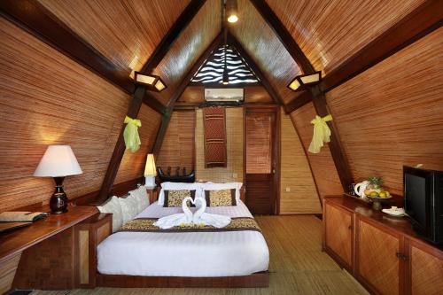 Habitación Doble Lumbung Hut del hotel Vila Ombak. Foto 3