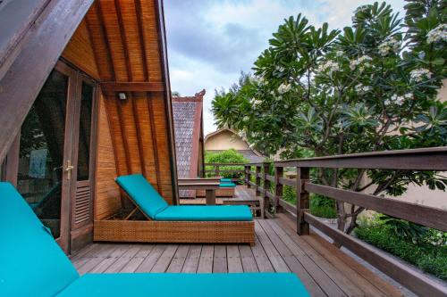 Habitación Doble Lumbung Hut del hotel Vila Ombak. Foto 4