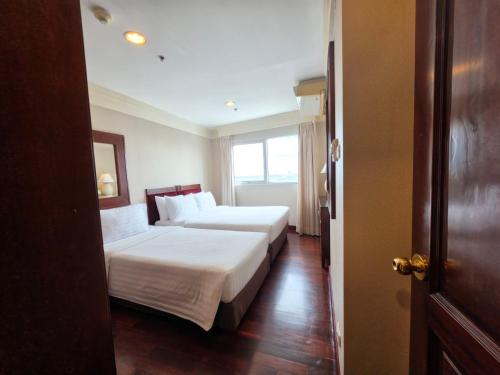 Sute de 3 dormitorios (Habitación Familiar) del hotel Prince Palace Bangkok. Foto 3