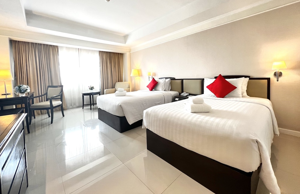 Habitación Deluxe con 2 camas individuales del hotel Mercure Chiang Mai. Foto 1