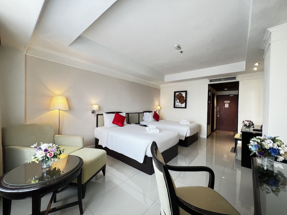 Habitación Deluxe con 2 camas individuales del hotel Mercure Chiang Mai. Foto 2