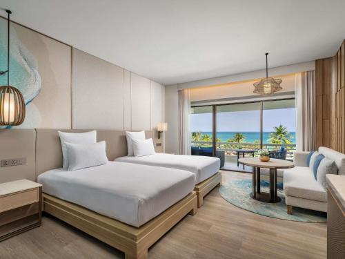 Habitación Doble Deluxe con vistas al mar - 2 camas del hotel Pullman Phuket Karon Beach Resort