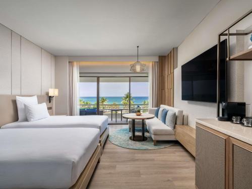 Habitación Doble Deluxe con vistas al mar - 2 camas del hotel Pullman Phuket Karon Beach Resort. Foto 4