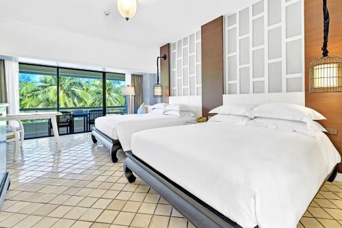 Habitación Familiar Superior del hotel Pullman Phuket Karon Beach Resort. Foto 4