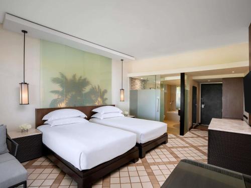 Habitación Doble Superior con vistas al jardín - 2 camas del hotel Pullman Phuket Karon Beach Resort. Foto 1