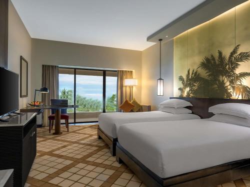 Superior Twin Room with Seaview del hotel Pullman Phuket Karon Beach Resort. Foto 1