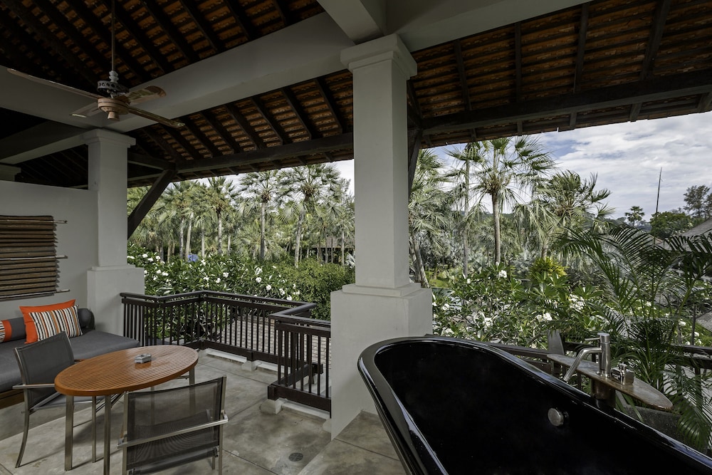 Suite Pearl Bed del hotel The Slate, Phuket. Foto 5