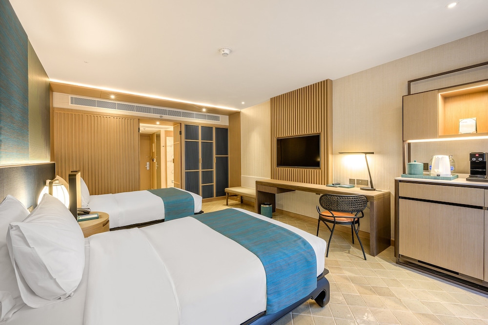 Habitación Premium, 2 camas individuales, balcón, vistas a la piscina del hotel Holiday Inn Resort Phuket, An Ihg