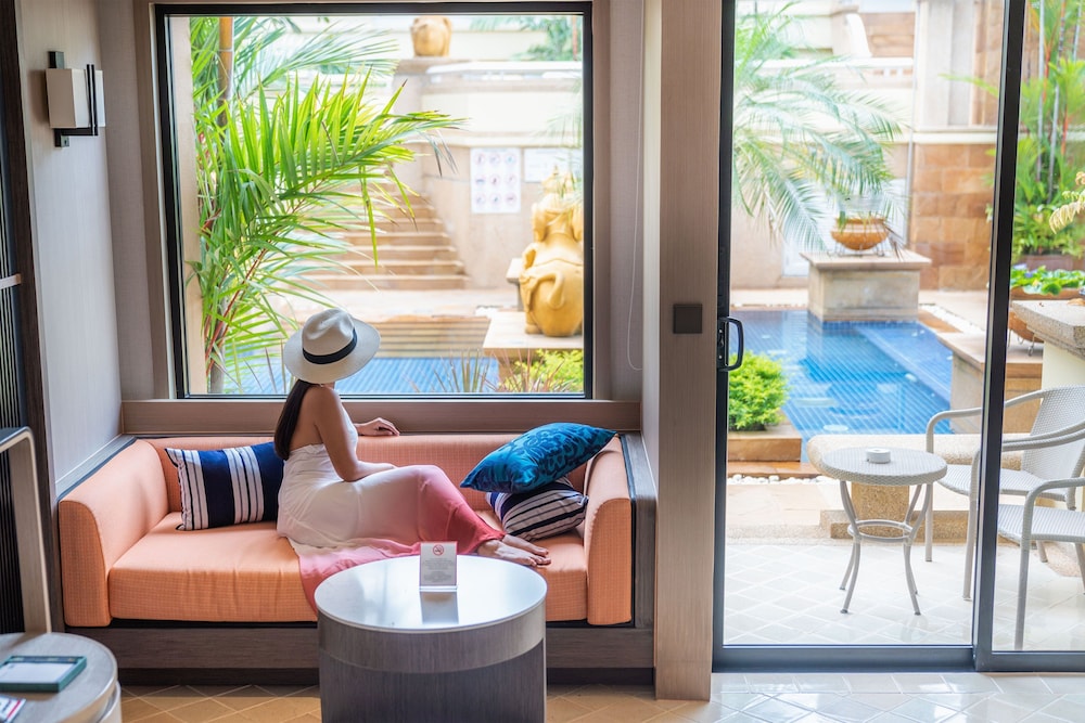 Habitación Premium, 1 cama de matrimonio grande, vistas a la piscina, planta baja del hotel Holiday Inn Resort Phuket, An Ihg. Foto 6