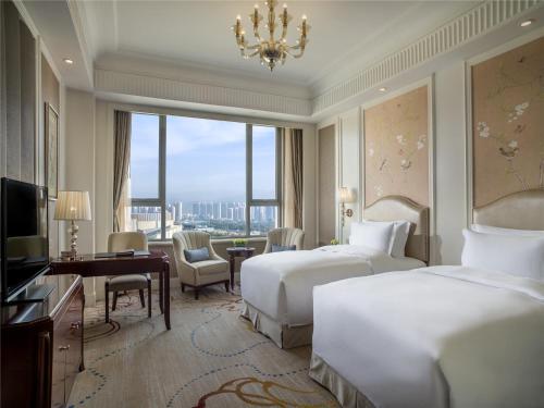 Habitación Deluxe con dos camas individuales del hotel Sofitel Xining. Foto 2