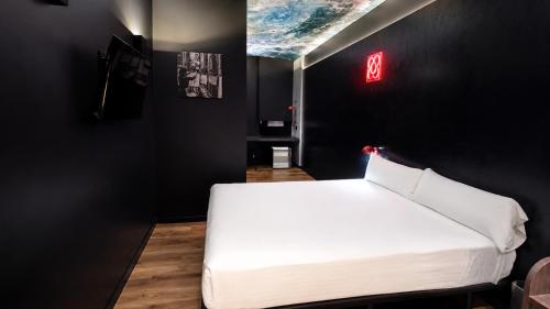 Habitación Doble Deluxe - 1 o 2 camas del hotel Yomo Hostal BCN Port. Foto 5