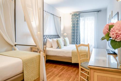 Habitación Triple del hotel Villa Alessandra. Foto 1