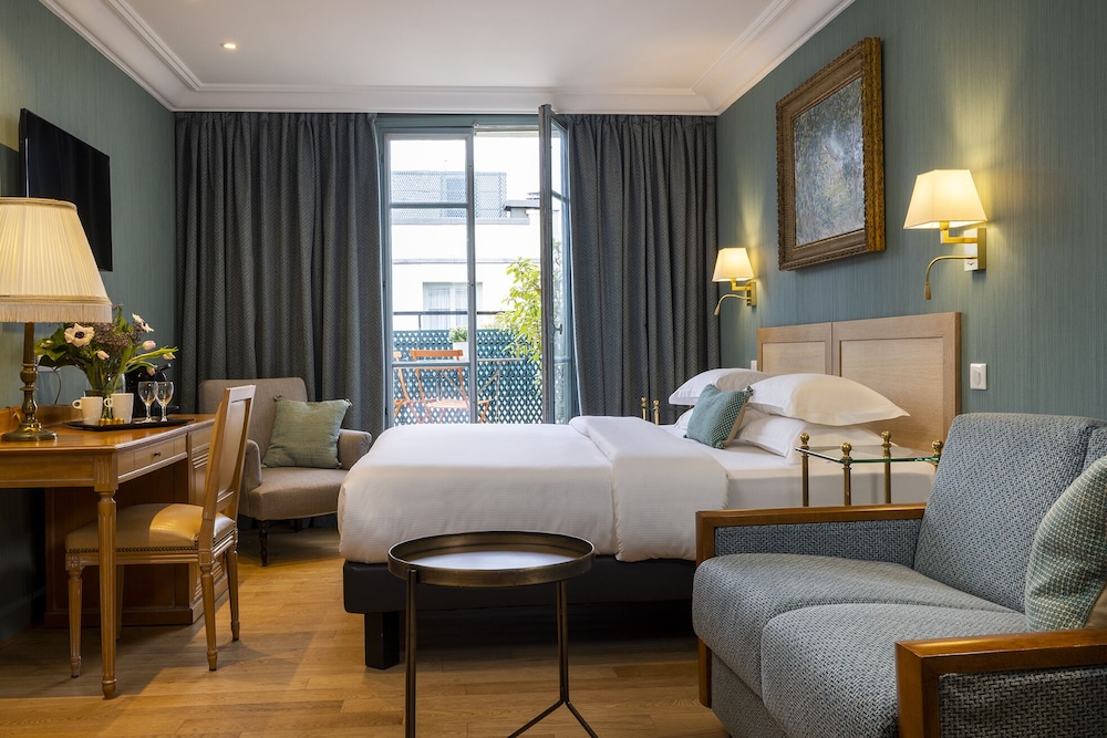 Habitación triple Deluxe del hotel Le Littré