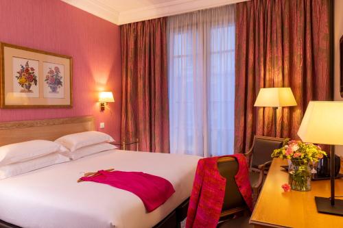 Habitación Clásica del hotel Le Littré. Foto 2