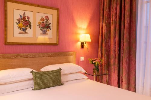 Habitación Clásica del hotel Le Littré. Foto 3