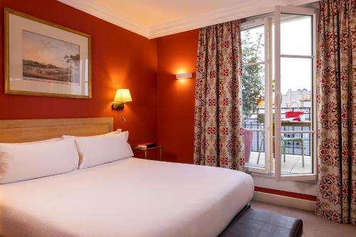 Habitación Doble Superior con terraza y vistas a la Torre Eiffel del hotel Le Littré. Foto 5