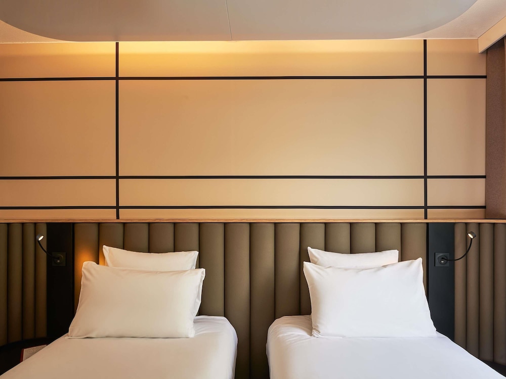 Habitación Clásica - 2 camas individuales del hotel Mercure Paris Nanterre. Foto 6