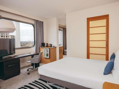 Habitación Doble Executive con sofá cama del hotel Novotel Paris Centre Tour Eiffel