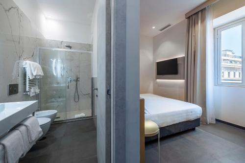 Habitación Cuádruple Deluxe del hotel California. Foto 4