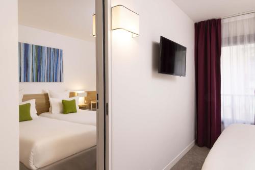 Habitación Twin Estándar del hotel Paris Louis Blanc