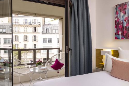 Habitación Doble Estándar del hotel Paris Louis Blanc. Foto 1