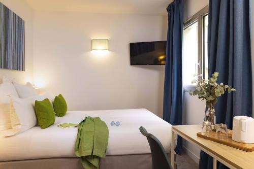 Habitación Doble Estándar del hotel Paris Louis Blanc. Foto 5
