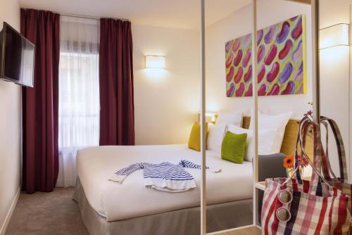 Habitación Doble Estándar del hotel Paris Louis Blanc. Foto 9
