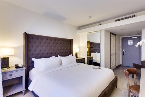 Habitación Clásica con terraza - Adaptada para personas con movilidad reducida - 1 cama extragrande del hotel Clinton South Beach. Foto 1