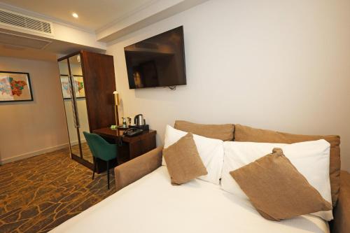 Habitación Executive King con sofá cama del hotel Mercure London Paddington. Foto 7
