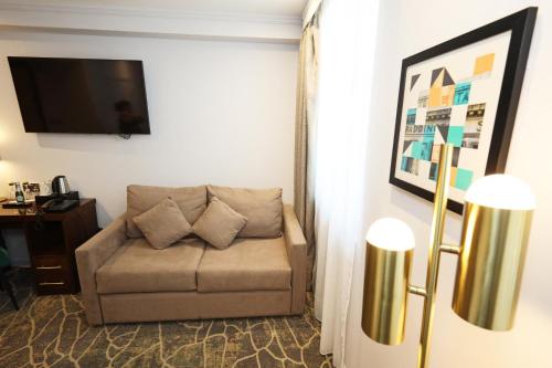 Habitación Executive King con sofá cama del hotel Mercure London Paddington. Foto 8