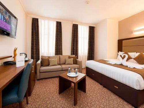 Habitación Executive King con sofá cama del hotel Mercure London Paddington. Foto 2